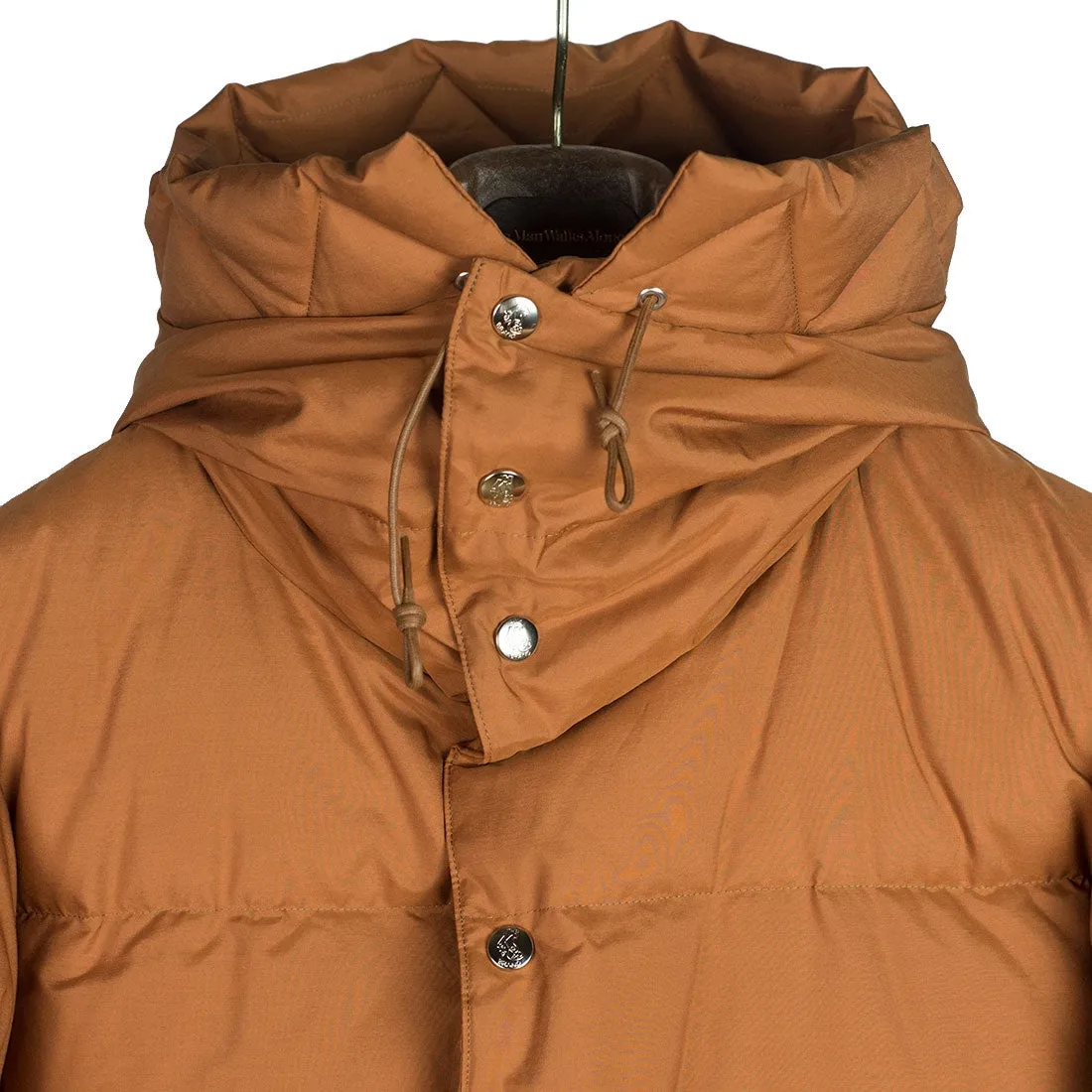 "Expedition Down Parka" in walnut orange