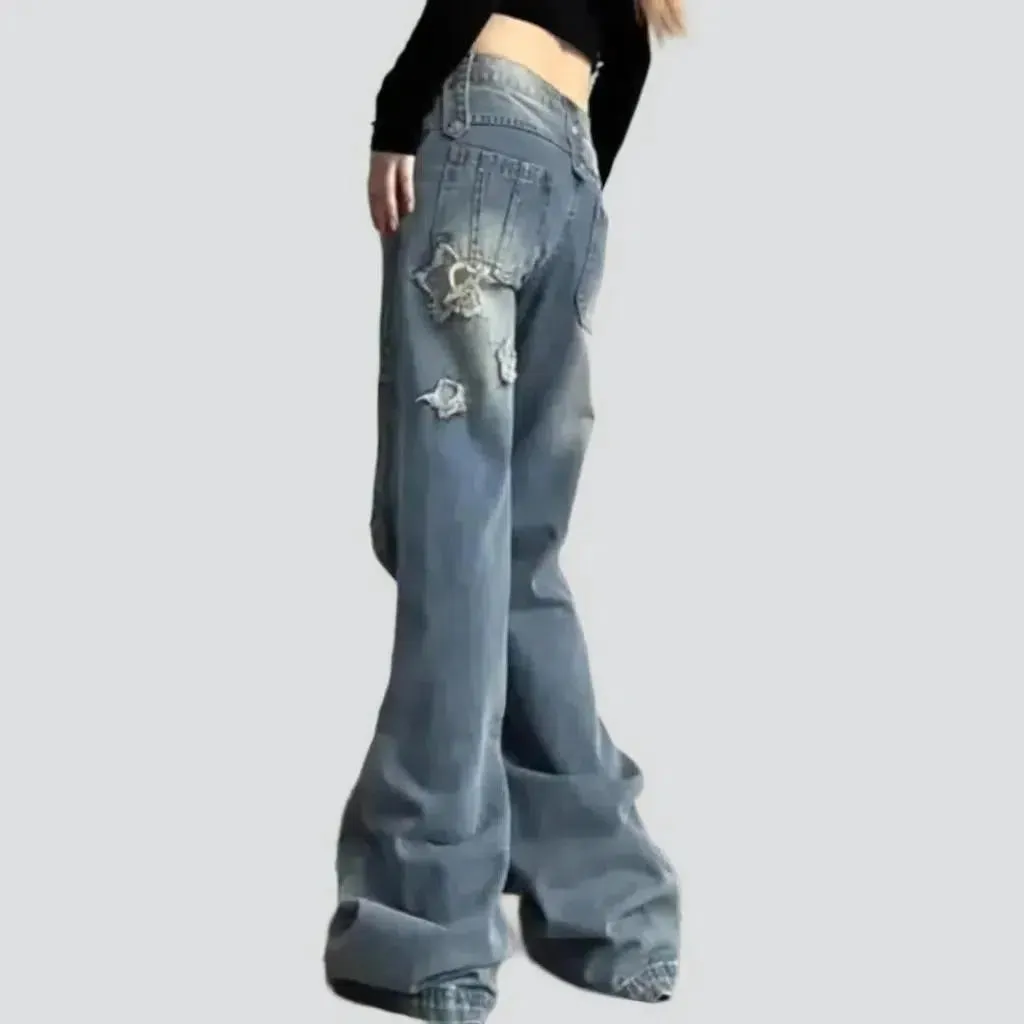 Sanded women's layered jeans